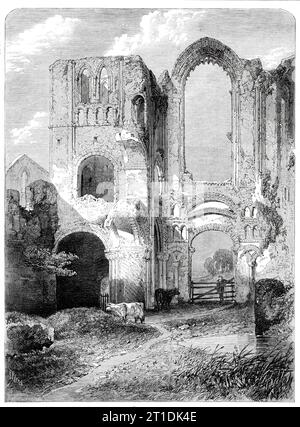 Ruins of Castle Acre Priory, Norfolk, von R. P. Leitch aus der Royal Academy Exhibition, 1860. Gravur von einem Gemälde. Die Ruinen von Castle Acre Priory in Norfolk, der SS gewidmet. Maria, Peter und Paulus gehören zu den malerischsten Objekten der Art, die es als Gedenkstätten der Frömmigkeit unserer Vorväter überlebt haben. Es wurde 1085 vom Earl of Surrey gegründet, als Anerkennung der Höflichkeit, die ihm in der Abtei von Clugny auf einer Pilgerreise nach Rom entgegengebracht wurde. Es befindet sich am Nar, und die Mauern umfassten ursprünglich 21 Hektar Land. Ein sehr schönes Gemälde von Stockfoto