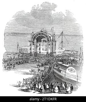 Der Prinz von Wales in Montreal - Pavilion on the Quay - Landung des Prinzen, 1860. Der zukünftige König Eduard VII. Besucht Nordamerika. "Der Prinz von Wales landete am Samstagmorgen, dem 25. August, in Montreal und wurde mit den enthusiastischsten Willkommensbekundungen von etwa 60.000 Menschen empfangen. Dieser Anlass war wahrscheinlich der auffälligste, den man je in Kanada erlebt hat. Die Straßen waren wunderschön dekoriert - es gab einige geschmackvoll gebaute Bögen; und die Prozession, die seine Königliche Hoheit vom Kai begleitete, nachdem der Bürgermeister eine Ansprache gehalten hatte, verkörperte alles Stockfoto