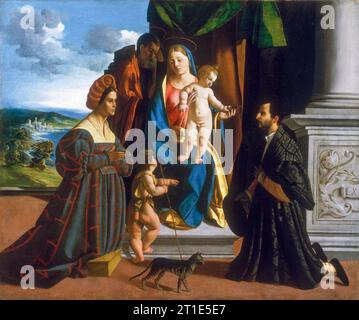 Dosso Dossi, die Heilige Familie, mit dem jungen Heiligen Johannes dem Täufer, einer Katze und zwei Spendern, Gemälde in Öl auf Leinwand, um 1512 Stockfoto