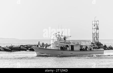 charterschiff Lazy Bones kehrt zu den Docks in montauk zurück Stockfoto