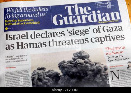 "Israel erklärt "Belagerung" von Gaza, während die Hamas Gefangene bedroht" Guardian Schlagzeilen-Titelseite israelischer palästinensischer Krieg 10 Oktober 2023 London Großbritannien Stockfoto