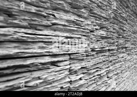 Holzähnliche Ziegelstruktur, Ziegelmuster für die Außen- oder Innenarchitektur. Schicke Putzabdeckung von Hausziegeln) Stockfoto