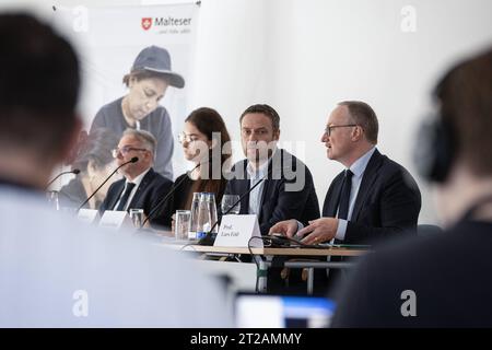 Sebastian Schilgen, Geschäftsführer Malteser Werke, Anastasiia Lotysh, Malteser Bundeskoordinatorin Mentale Gesundheit in der Betreuung Geflüchteter, Patrick Pöhler, Pressesprecher von Malteser, Prof. Lars Feld, Ökonom und Leiter des Walter-Eucken-Instituts in Freiburg bei der Pressekonferenz zur Vorstellung des 4. Malteser Migrationsberichte, 18.10.2023, Hotel Aquino, Berlin, Deutschland *** Sebastian Schilgen, Geschäftsführer Malteser Werke, Anastasiia Lotysh, Malteser Bundeskoordinator psychische Gesundheit in der Flüchtlingspflege, Patrick Pöhler, Pressesprecher von Malteser, Prof. Lars Feld, EC Stockfoto