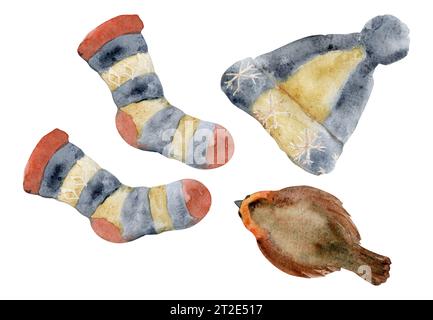 Handgezeichnete Aquarellillustration. Handgefertigte beige blaue rote Wollmütze mit Pompon und gestreiften Socken, robin Bird. Zusammensetzung isoliert auf Stockfoto