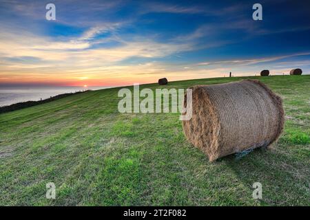Hartland Kai Sonnenuntergang aus stehendem Stein Stockfoto