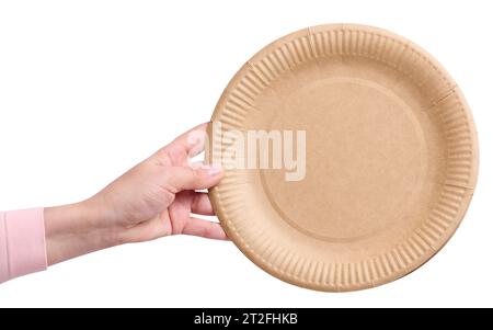 Die Hand der Frau hält einen runden Papierteller Stockfoto