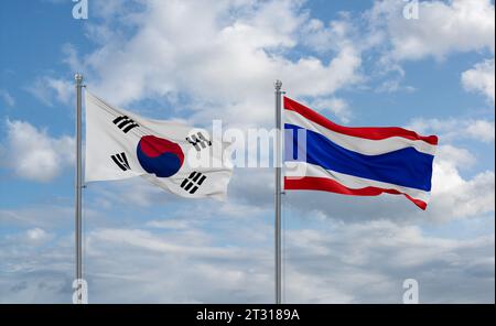 Königreich Thailand und Brasilien Flaggen winken zusammen im Wind auf blauem bewölktem Himmel, zwei Länder-Beziehungskonzept Stockfoto