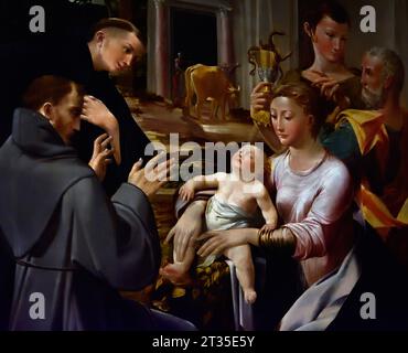 Die Madonna und das Kind mit St. Joseph von St. verehrt Anthony von Padua, St. Franziskus von Assisi und St. Johannes der Evangelist 1533-37 von Girolamo Mazzola Bedoli 1500 - 1569 Museum, Italien. Stockfoto