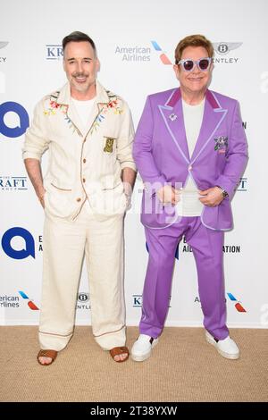 Aktenfoto vom 24/07/19 von Elton John und David Furniture, die an der Elton John AIDS Foundation Midsummer Party in Frankreich teilnahmen. Die Fotografie aus der Sammlung von Elton John und David Furish wird nächstes Jahr in einer Ausstellung mit dem Titel Fragile Beauty im Victoria and Albert Museum (V&A) gezeigt. Ausgabedatum: Dienstag, 24. Oktober 2023. Stockfoto