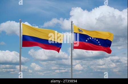 Venezolanische und kolumbianische Fahnen winken zusammen im Wind auf blauem bewölktem Himmel Stockfoto