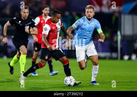 ROTTERDAM, NIEDERLANDE - 25. OKTOBER: Igor Paixao (Feyenoord Rotterdam) und Ciro immobile (SS Lazio) während der Gruppe E - UEFA Champions League 2023/24 Stockfoto