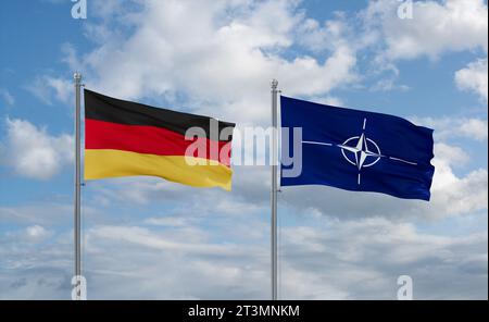 NATO- und Deutschland-Flaggen schwenken zusammen auf blauem bewölktem Himmel, Kooperationskonzept Stockfoto