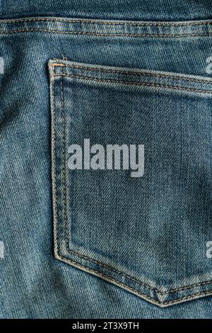 Nahaufnahme mit strukturiertem Hintergrund aus Jeans in blauem Denim Stockfoto