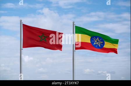 Äthiopische und marokkanische Flaggen schwenken zusammen auf blauem bewölktem Himmel, zwei Länder-Beziehungskonzept Stockfoto