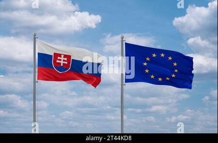 Die Fahnen der Europäischen Union und der Slowakei winken zusammen im Wind auf blauem bewölktem Himmel, Beziehungskonzept Stockfoto