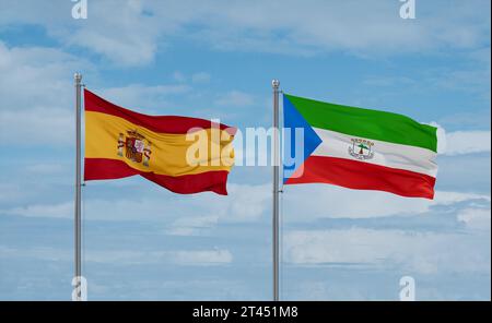Flaggen von Äquatorialguinea und Spanien schwenken zusammen auf blauem bewölktem Himmel, zwei Länder-Beziehungskonzept Stockfoto