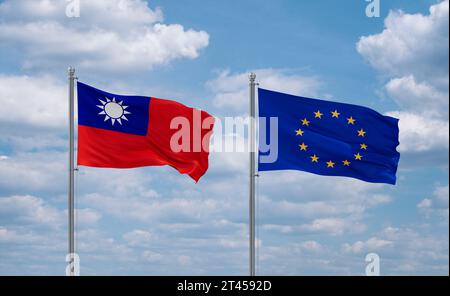 Europäische Union und Taiwan winken gemeinsam im Wind auf blauem bewölktem Himmel, Beziehungskonzept Stockfoto