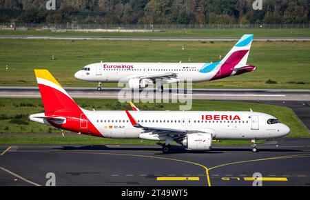 Flughafen Düsseldorf, Eurowings Flieger nach der Landung, Airbus, auf der Start- und Landebahn, Iberia Airbus A320neo auf dem Rollweg, Luftverkehr DUS *** Flughafen Düsseldorf, Eurowings Flugzeug nach der Landung, Airbus, auf der Start- und Landebahn, Iberia Airbus A320neo auf dem Rollweg, Flugverkehr DUS Credit: Imago/Alamy Live News Stockfoto