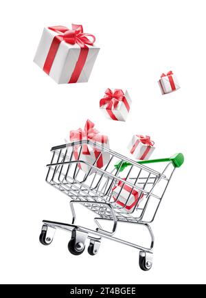 Weihnachtsgeschenkboxen fallen isoliert aus dem Einkaufswagen heraus Stockfoto
