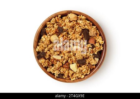 Hausgemachtes Müsli in Holzschale auf weißem Hintergrund Stockfoto