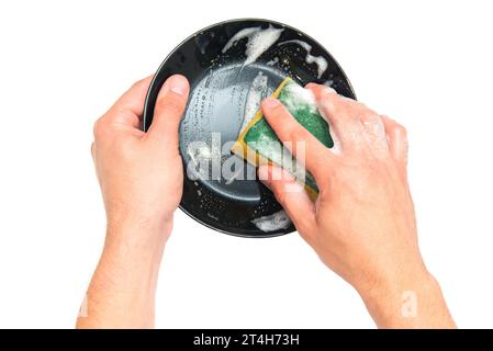 Waschen der Platte. Die Hände waschen seinen Teller nach dem Essen. Hausreinigung. Geschirrreiniger. Stockfoto
