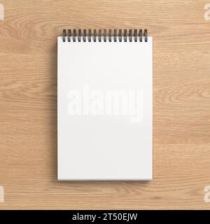 Notebook-Modell. Leeres Notebook am Arbeitsplatz. Spiral-Notizblock auf hölzernem Hintergrund. 3D-Abbildung Stockfoto