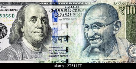 Porträts von Benjamin Franklin auf us-Dollar-Banknoten und Mahatma Gandhi auf indischen Rupien. Geschäftskonzept des Wechselkurses, Börsenhandel Stockfoto