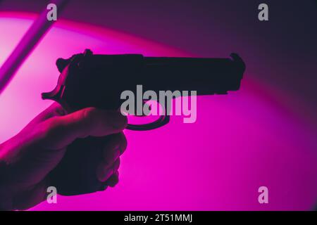 Pistolenpistole künstlerische Fotografie Bucheinband Design. Stockfoto