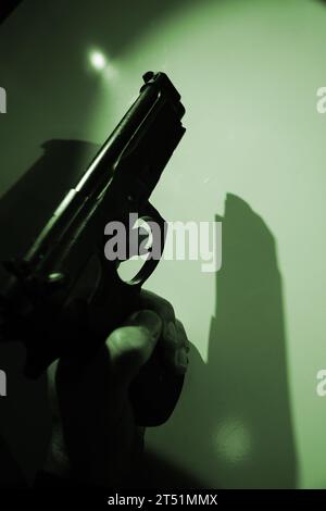 Pistolenpistole künstlerische Fotografie Bucheinband Design. Stockfoto