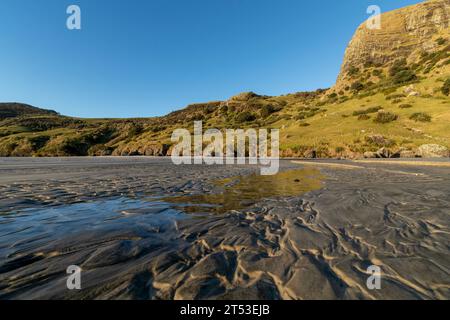 Spirits Bay oder Kapowairua, die ruhige Landschaft des Cape Reinga bei Sonnenuntergang im Te Paki Recreation Reserve, Northland, Neuseeland Stockfoto