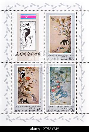 Souvenirbogen mit gestempelten Briefmarken von Nordkorea, die Gemälde von O UN BYOL zeigen, um 1978. Stockfoto
