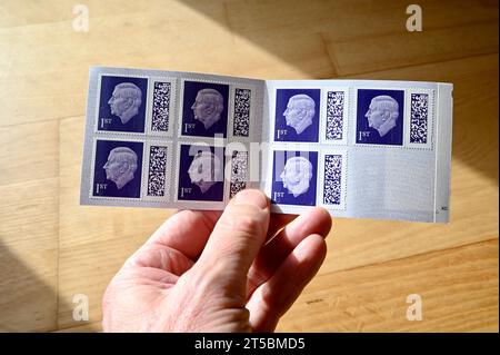 Buch der ersten Klasse Briefmarken, Großbritannien Stockfoto