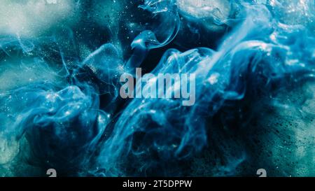 Farbe Rauch Hintergrund blau Glitzer Farbe Wasser Stockfoto