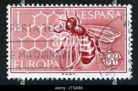 SPANIEN - CA. 1962: Stempel gedruckt von Spanien, zeigt Biene und Honigwaben, ca. 1962 Stockfoto