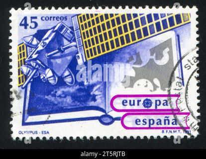 SPANIEN - CA. 1991: Briefmarke gedruckt von Spanien, zeigt Olympus I Satellite, ca. 1991 Stockfoto