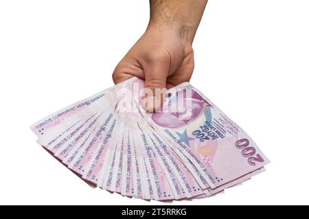 Eine nicht erkennbare Hand zeigt 200 türkische Liras von oben auf dem Bildschirm Stockfoto