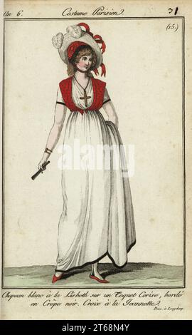 Frau mit Lisbeth-Hut in der Mode von 1798. Ihr weißer Hut im Lisbeth-Stil wird über einer kirschroten Mütze mit schwarzem Krepp getragen. Ihr Kreuz im Bauernstil auf einer Samtschnur (a la Jeannette) war seit 1782 beliebt. Der Hut wurde von der Schweizer Bauernfigur Lisbeth in der Oper von Gretry und Edmond de Favieres inspiriert, gespielt von Madame Saint-Aubin an der Opera-Comique, 10. Januar 1797. Gezogen auf der Longchamp Rennstrecke. Chapeau blanc a la Lisbeth sur un toque cerise borde en Crepe noir. Croix a la Jeannette. (Dess. à Longchamp) handkolorierter Kupferstich aus Pierre de la Mesangeres Journal d Stockfoto