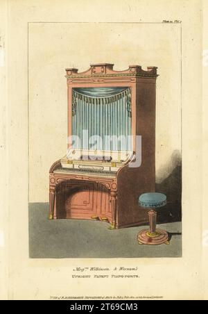 Rechtes Klavier aus Mahagoni oder Palisander mit Vorhangfassade, es war 2 Meter hoch und nahm den gleichen Platz ein wie ein Bücherregal. George Wilkinson und Robert Wornums Upright Patent Piano-Forte, 1812. Handkolorierter Kupferstich aus dem Upholsterer's and Cabinet Maker's Repository, bestehend aus 76 Entwürfen moderner und modischer Möbel, Rudolph Ackermann, London, 1830. Stockfoto