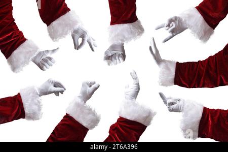 Detail der Gesten mit dem Arm des Weihnachtsmanns in traditioneller Kleidung und weißen Handschuhen. Stockfoto