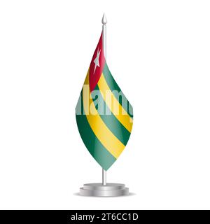 Togo-Flagge – 3D-Mini-Flagge hängt am Tischfahnenmast. Verwendbar für Gipfelpräsentationen oder Konferenzen. Vektorabbildung mit Schattierung. Stock Vektor