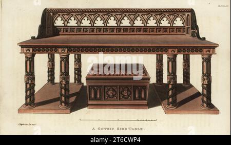 Ein gotischer Beistelltisch, entworfen von John Taylor, Polsterer und Möbeldesigner in Bedford Court, Covent Garden, London 1821-1829. Der Tisch ist aus geschnitztem Holz mit acht Beinen auf Plafforms. Der Keller oder Weinschrank darunter ist in Form eines Sarkophags, der von einem Grab in der Kirche von Luton kopiert wurde. Handkolorierter Kupferstich nach einer Illustration von John Taylor aus dem Rudolph Ackermanns Repository of Arts, Literature, Fashions, Manufakturen usw., Strand, London, 1821. Stockfoto