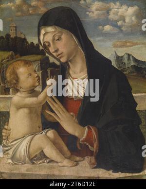 Madonna und Kind, 1480-1485. Christus und Maria&#x2019;s Göttlichkeit wird heruntergespielt; ihre Halos sind kaum zu sehen und erscheinen ganz einfach als Mutter und Sohn. Sie teilen einen intimen und fast spielerischen Austausch, während das Christuskind an der Hand seiner Mutter&#x2019;hält und nach ihrem Gesicht greift. Die Madonna hat das Kind auf einem Steintisch gestützt (vielleicht an einen Altar erinnert) und vor einer weitläufigen Landschaft mit felsigen Klippen, sanften Hügeln und einer fernen Burg. Stockfoto