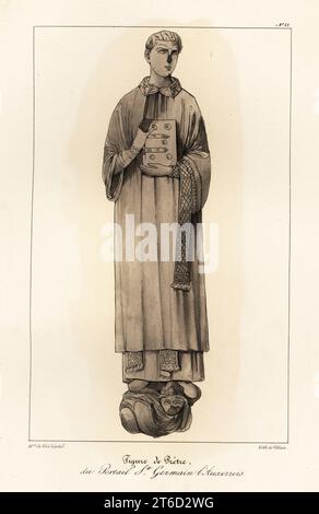 Figur eines Priesters in kirchlichen Gewändern mit Bibel, aus dem Portal von Saint-Germain lAuxerrois. Figur de Pretre, du Portail St. Germain lAuxerrois. Getönte Lithografie von Bösewicht nach einer Illustration von Horace de vier-Castel aus seiner Sammlung des Kostüms, Armes et meubles pour servir à l’histoire de la France (Sammlung von Kostümen, Waffen und Möbeln für die Geschichte Frankreichs), Treuttel & Wurtz, Bossange, 1827. Stockfoto