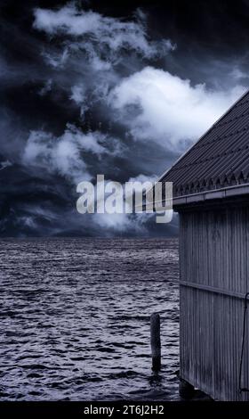 Europa, Deutschland, Mecklenburg-Vorpommern, Region Müritz, Mecklenburgische Seenplatte, Nationalpark Müritz, Bootshäuser am Ufer der Müritz Stockfoto