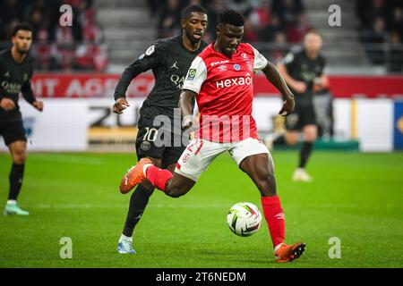 11. November 2023, Reims, Frankreich: Ousmane DEMBELE von PSG und Azor MATUSIWA von Reims während des Ligue-1-Spiels zwischen Stade de Reims und Paris Saint-Germain (PSG) im Auguste-Delaune-Stadion am 11. November 2023 in Reims. (Kreditbild: © Matthieu Mirville/ZUMA Press Wire) NUR REDAKTIONELLE VERWENDUNG! Nicht für kommerzielle ZWECKE! Stockfoto