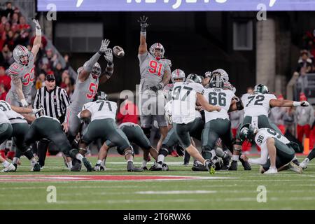 12. November 2023, Columbus, Ohio, USA: Der Michigan State Spartans-Platzkicker Jonathan Kim (97) versucht in der ersten Hälfte des Spiels ein Tor zwischen den Michigan State Spartans und den Ohio State Buckeyes im Ohio Stadium, Columbus, Ohio. (Kreditbild: © Scott Stuart/ZUMA Press Wire) NUR REDAKTIONELLE VERWENDUNG! Nicht für kommerzielle ZWECKE! Stockfoto