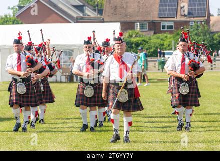 Reading Scottish Pipe Band, Old Windsor Carnival, Recreation Ground, St. Luke's Road, Old Windsor, Berkshire, England, Vereinigtes Königreich Stockfoto