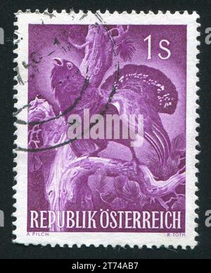 ÖSTERREICH - UM 1959: Briefmarke von Österreich, zeigt Auerhühner, um 1959 Stockfoto