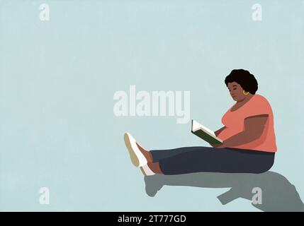 Frau sitzt und liest Buch, entspannt Stockfoto