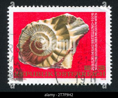 ÖSTERREICH - UM 1976: Stempel von Österreich, zeigt Ammonit, um 1976 Stockfoto